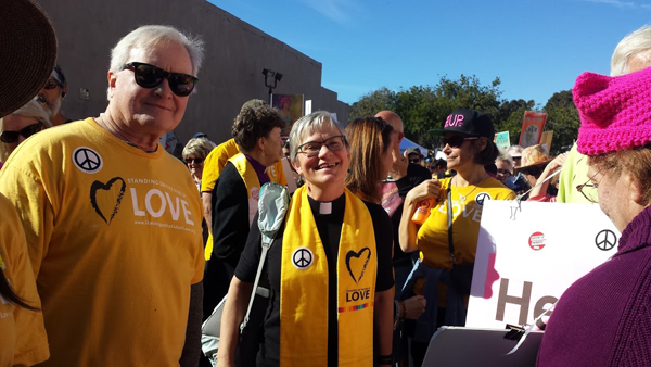 UUCV members with Rev. Dana Worsnop wearing yellow UU Love clothing at the 2018 Ventura Women's March